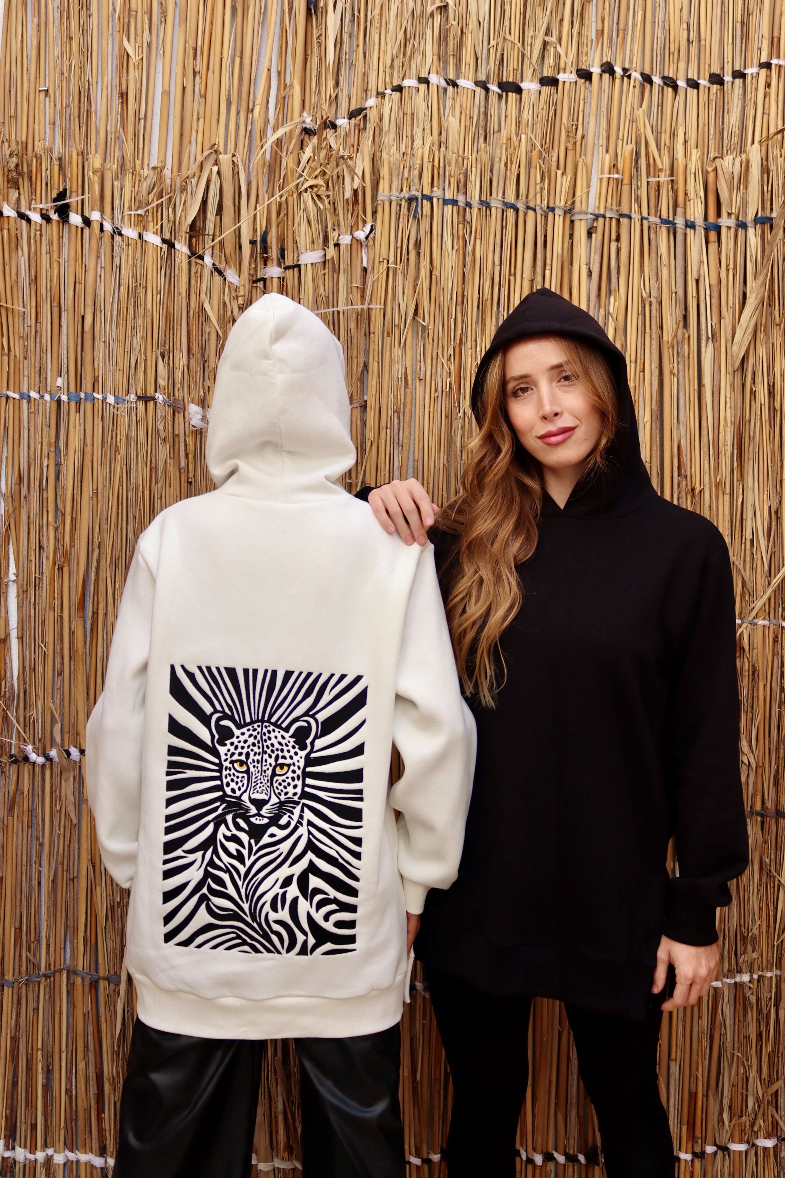 Off-white sweatshirt with a black cheetah